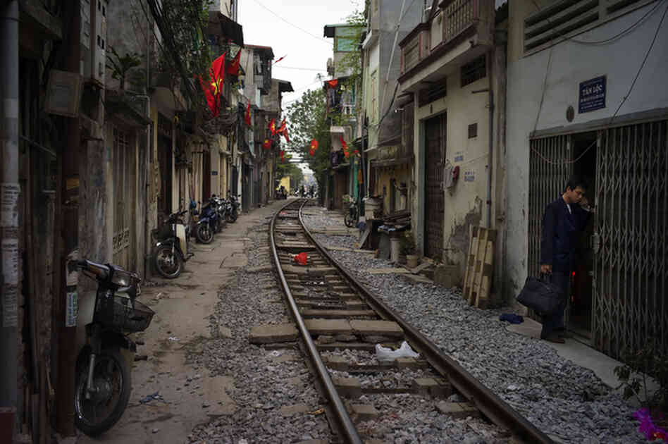 A neighborhood built along railroad tracks is seen in Hanoi, Vietnam, February 2010.