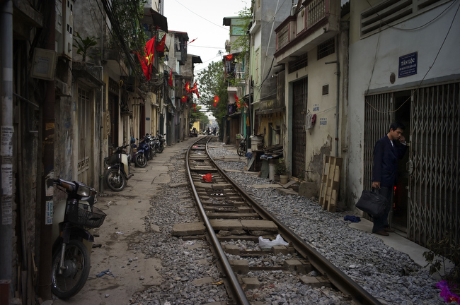 A neighborhood built along railroad tracks is seen in Hanoi, Vietnam, February 2010.