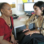 HIV patient Darnell Hollie, 47, talks to her doctor Monica Gandhi (right) at San Francisco General Hospital. Her path from drug addict to model patient was "a lot of work, but if you want it, it's there for you," Hollie says. HIV patient Darnell Hollie, 47, talks to her doctor Monica Gandhi (right) at San Francisco General Hospital. Her path from drug addict to model patient was "a lot of work, but if you want it, it's there for you," Hollie says.