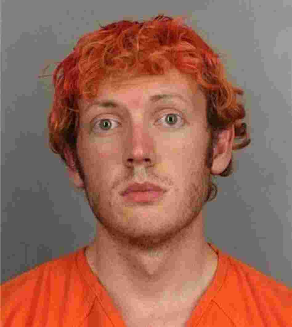James Holmes in a photograph taken by police during his booking.