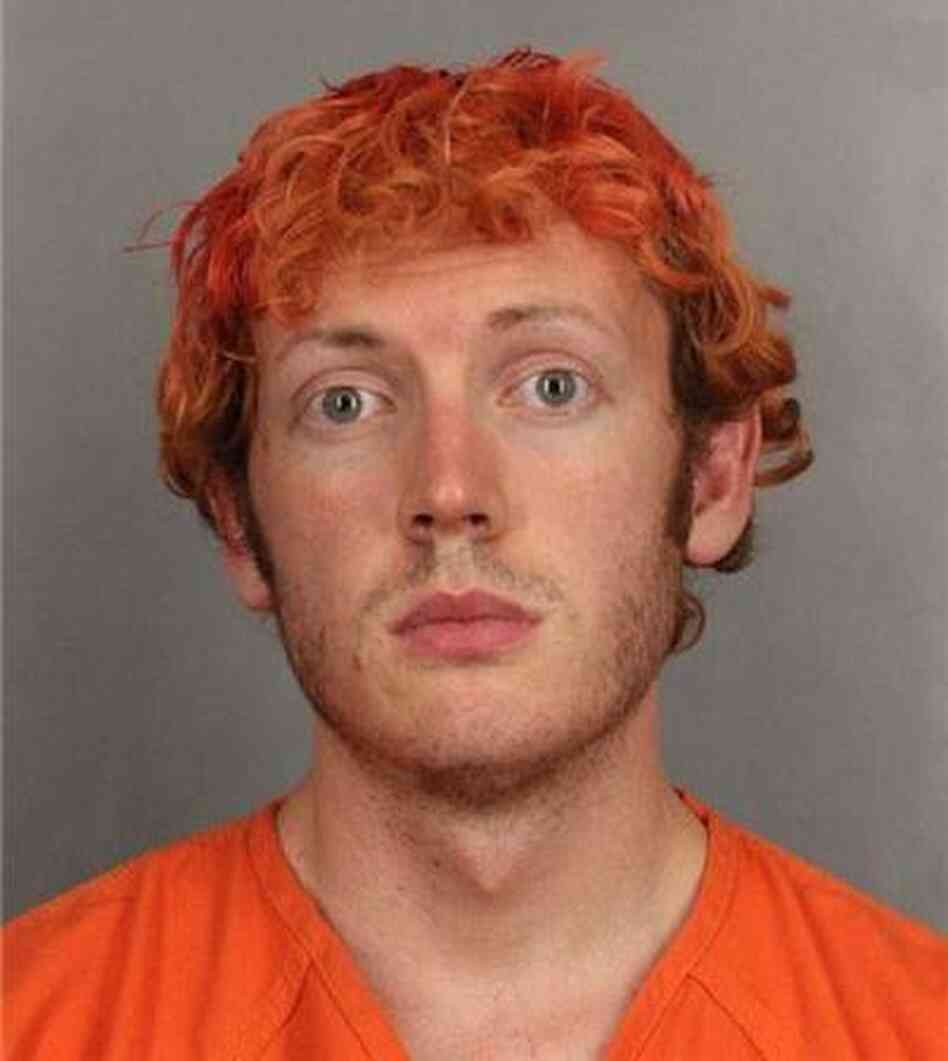 James Holmes in a photograph taken by police during his booking.