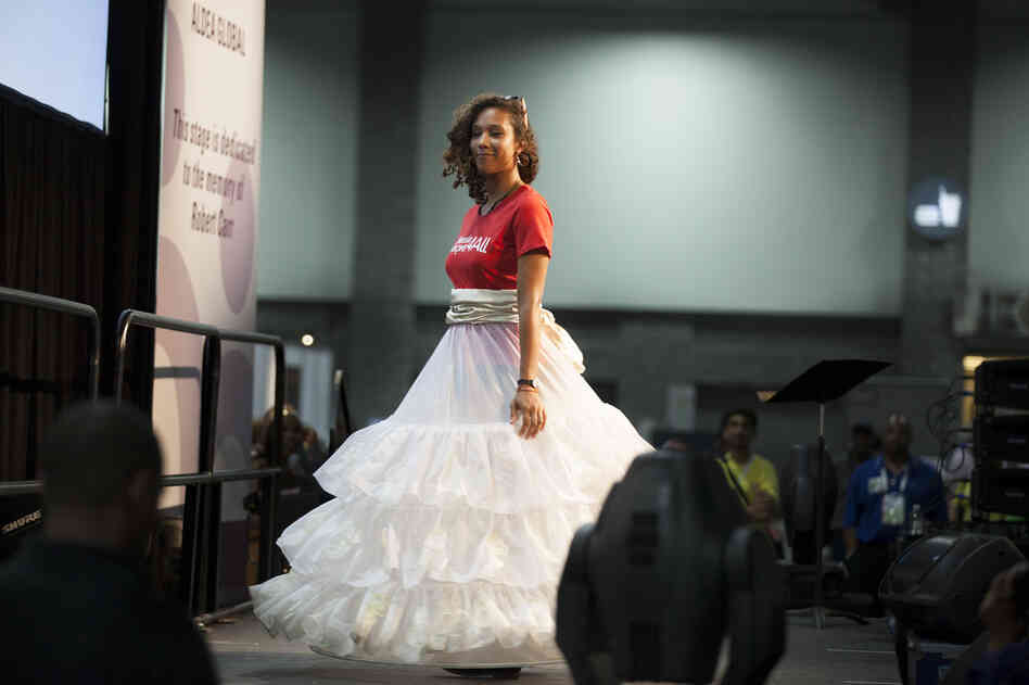 The show was coordinated by a Dutch group, whose goal is to make female condoms available, accessible and affordable around the globe. Rishona Hines from Woodbury, Conn., wears a dress made in the Netherlands.