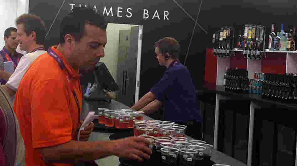 The "Thames Bar" was flowing with free drinks Monday, as the London 2012 group welcomed journalists to the Main Press Center.