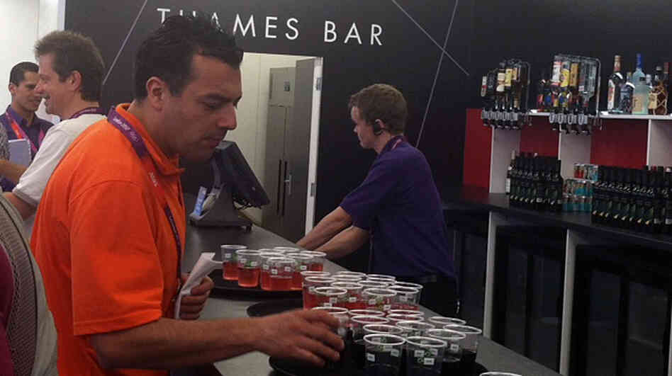 The "Thames Bar" was flowing with free drinks Monday, as the London 2012 group welcomed journalists to the Main Press Center.