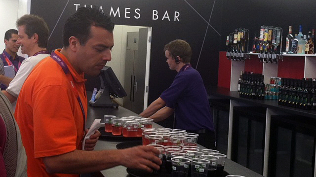The "Thames Bar" was flowing with free drinks Monday, as the London 2012 group welcomed journalists to the Main Press Center.