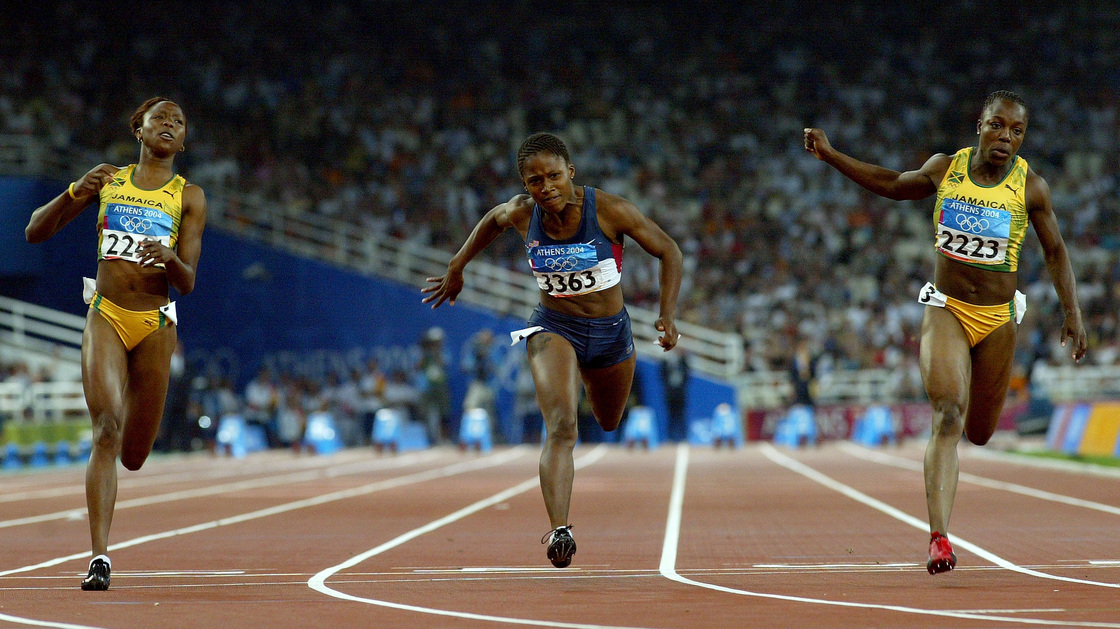Sherone Simpson of Jamaica, Lauryn Williams of the U.S. and Veronica Campbell of Jamaica compete in the women's 100 meter final at the Athens 2004 Summer Olympic Games, the race in which Williams won her silver medal.