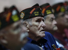 Members of the Veterans of Foreign Wars look on Monday as President Obama speaks during the group's national convention in Reno, Nev. Republican Mitt Romney was scheduled to speak to the group on Tuesday. Members of the Veterans of Foreign Wars look on Monday as President Obama speaks during the group's national convention in Reno, Nev. Republican Mitt Romney was scheduled to speak to the group on Tuesday.