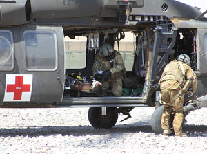 A NATO/U.S. medevac helicopter transports an Afghan civilian wounded by an IED near Camp Ricketts, a small NATO base in Muqur District, Badghis Province. A NATO/U.S. medevac helicopter transports an Afghan civilian wounded by an IED near Camp Ricketts, a small NATO base in Muqur District, Badghis Province.