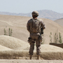 A Spanish NATO soldier on patrol in Afghanistan. Insurgents in the country have been busier this summer than last, and more often than not, civilians are paying the price.