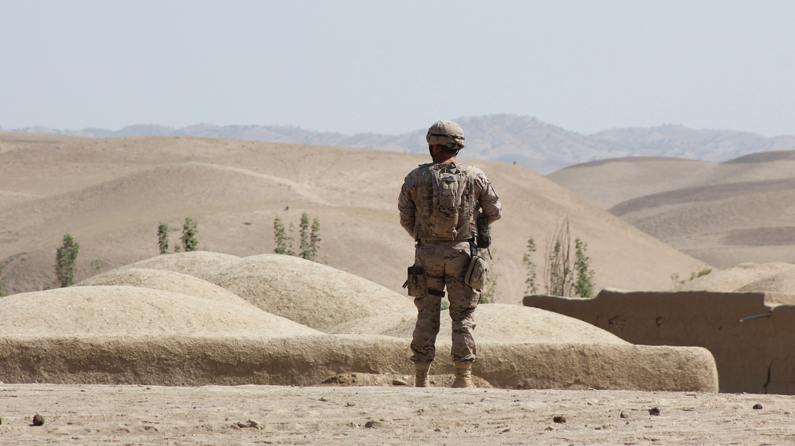 A Spanish NATO soldier on patrol in Afghanistan. Insurgents in the country have been busier this summer than last, and more often than not, civilians are paying the price.