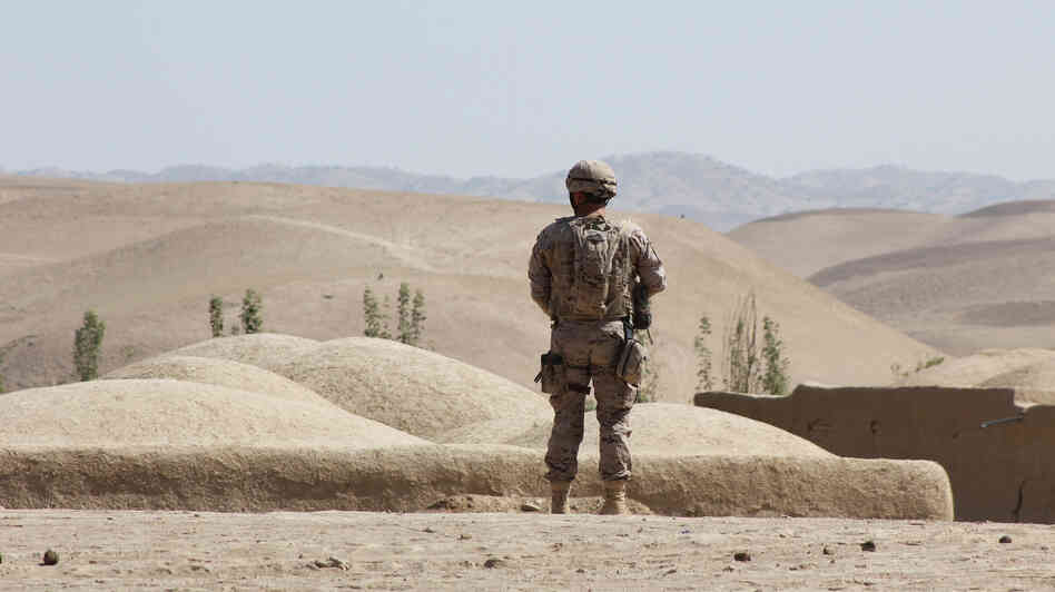 A Spanish NATO soldier on patrol in Afghanistan. Insurgents in the country have been busier this summer than last, and more often than not, civilians are paying the price.