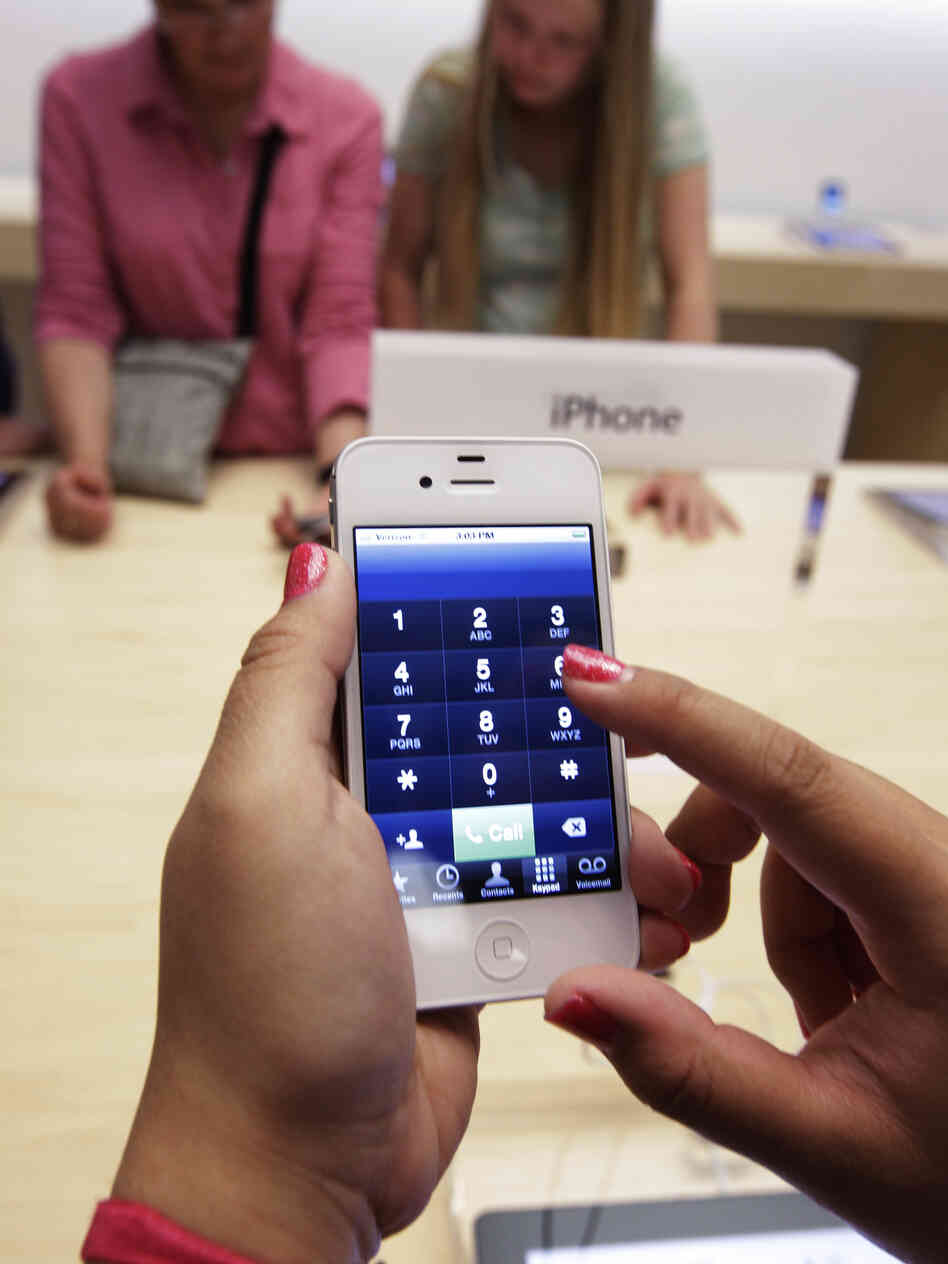 Apple reported lower-than-expected third-quarter revenues, numbers partly blamed on slower iPhone sales.