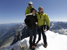 Former Rep. Gabrielle Giffords (center) and her husband Mark Kelly (right), at the peak of Aiguille du Midi in the French Alps on Monday. Behind them is mountain guide Vincent Lameyre. Former Rep. Gabrielle Giffords (center) and her husband Mark Kelly (right), at the peak of Aiguille du Midi in the French Alps on Monday. Behind them is mountain guide Vincent Lameyre.