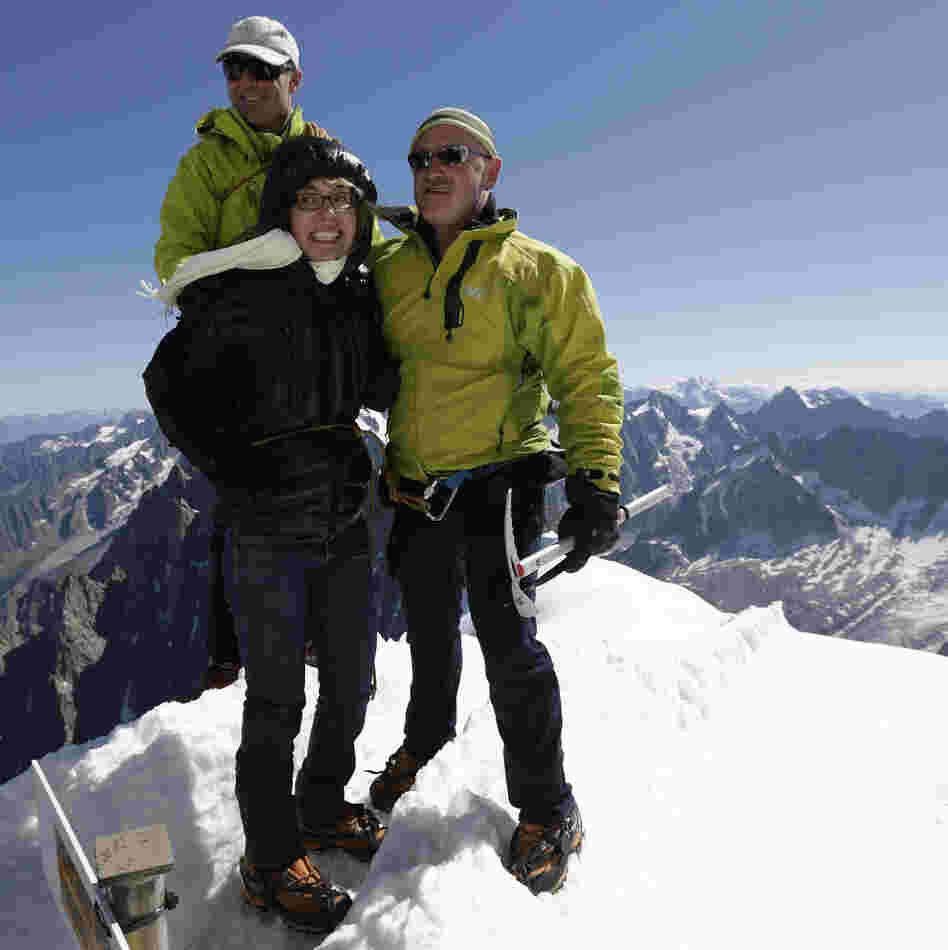 Former Rep. Gabrielle Giffords (center) and her husband Mark Kelly (right), at the peak of Aiguille du Midi in the French Alps on Monday. Behind them is mountain guide Vincent Lameyre.