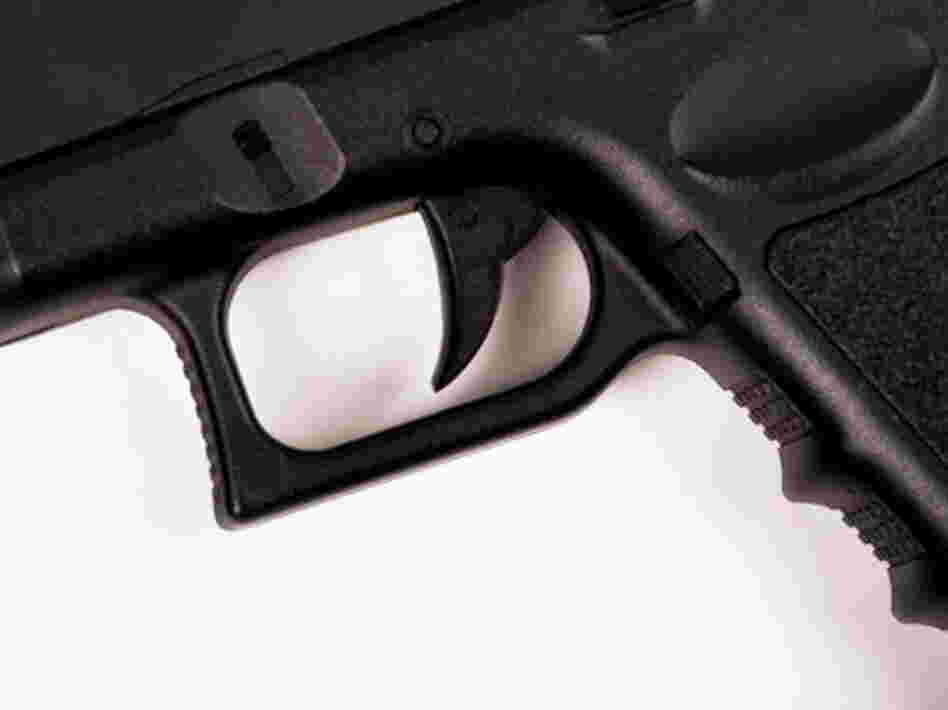 The trigger of a Glock handgun. The trigger of a Glock handgun.