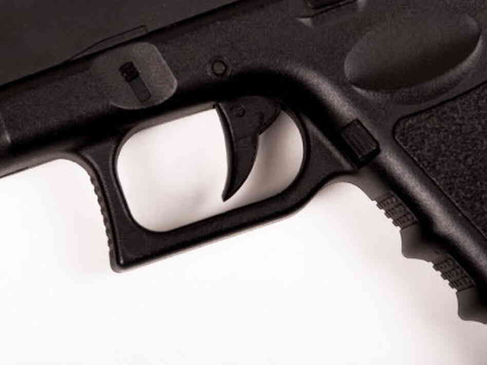The trigger of a Glock handgun. The trigger of a Glock handgun.