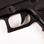 The trigger of a Glock handgun.