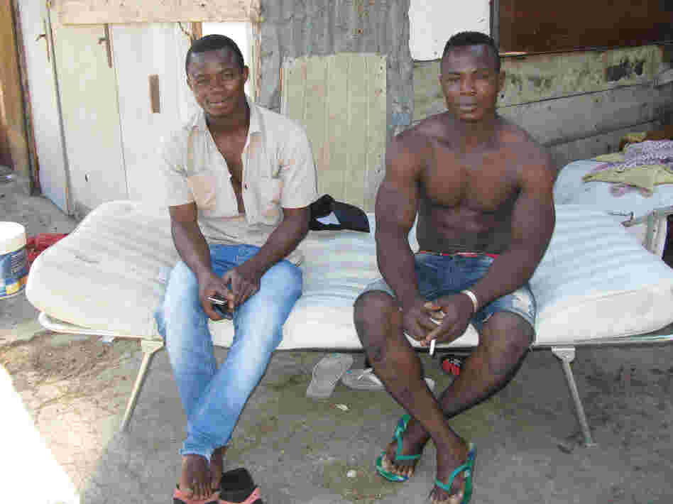 African migrants fired from Italian factories in the north have joined the swelling ranks of people searching for agriculture work in the south. Originally from Burkina Faso, Karim Suruku (right) is a migrant worker in Calabria in southern Italy. At left is Amidou Denamidou.