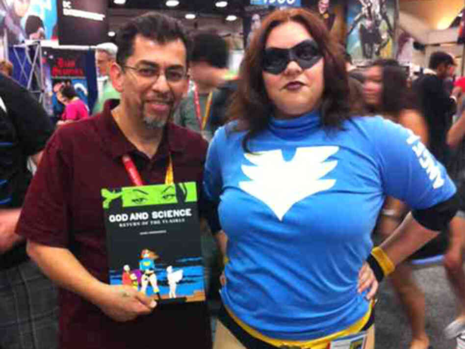 Love and Rockets author Jaime Hernandez, with a fan dressed as Boot Angel, one of the characters in God and Science. Love and Rockets author Jaime Hernandez, with a fan dressed as Boot Angel, one of the characters in God and Science.