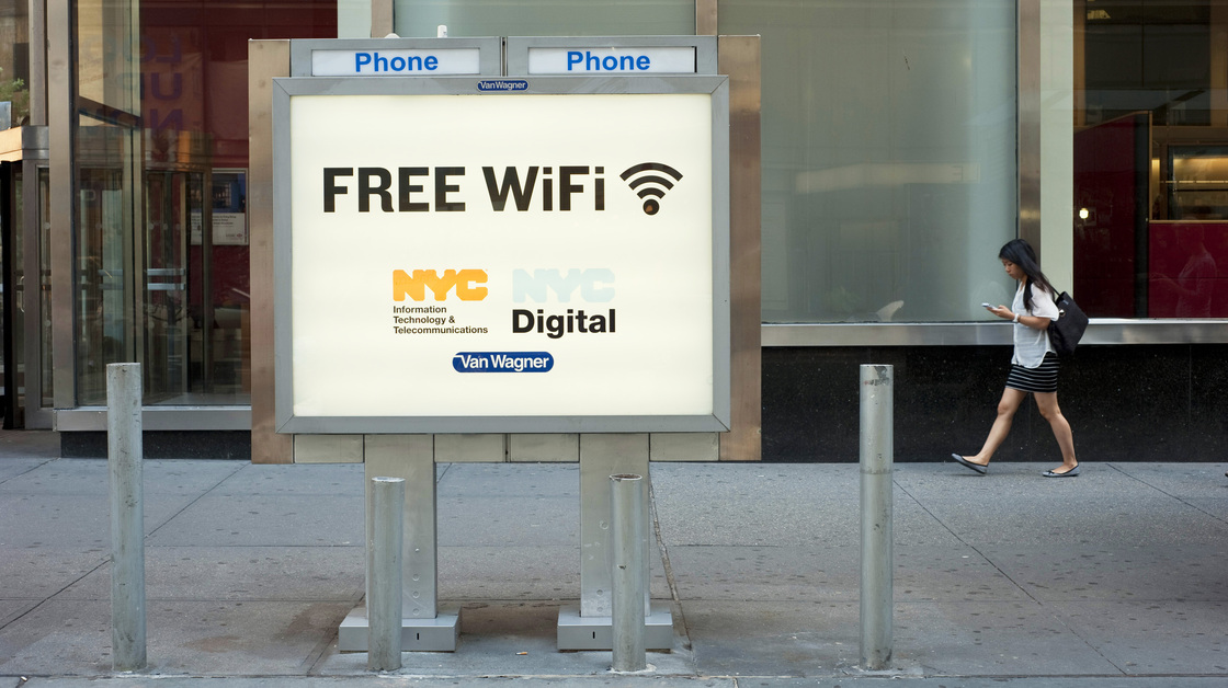 A phone booth serves as a free Wi-Fi hot spot in New York City's Columbus Circle.