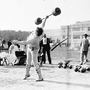 Who needs two hands? At the 1904 Olympics in St. Louis, the events included All Around Dumbell, which comprised 10 one- and two-handed lifts. Who needs two hands? At the 1904 Olympics in St. Louis, the events included All Around Dumbell, which comprised 10 one- and two-handed lifts.