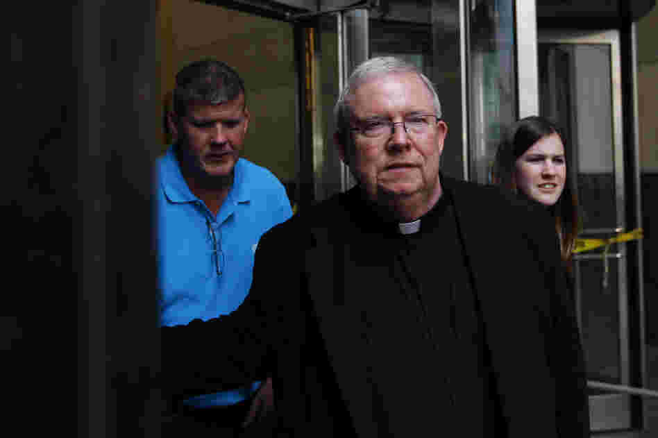 Monsignor William Lynn exits the Criminal Justice Center on Tuesday in Philadelphia.