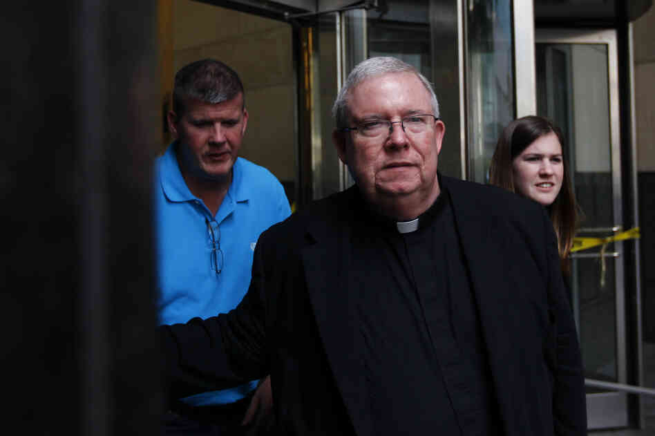 Monsignor William Lynn exits the Criminal Justice Center on Tuesday in Philadelphia.