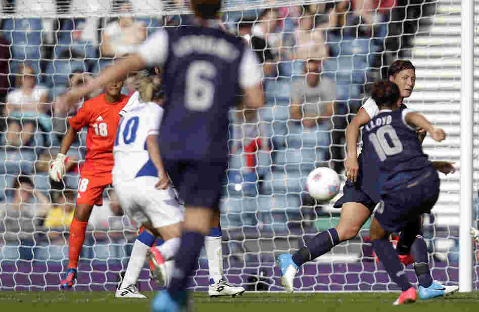 Carli Lloyd scores the U.S. team's winning goal, in a comeback win over France. The Americans are bidding for their third straight Olympic gold medal.