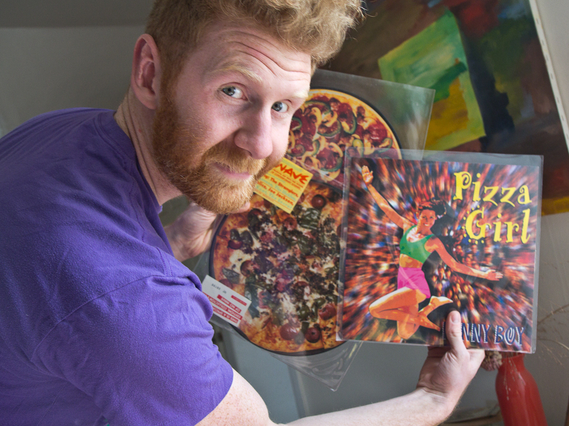 Brian Dwyer owns the world's largest collection of pizza-related items. He plans to display some of his memorabilia, including pizza-themed music records, in a new museum-restaurant in Philadelphia.