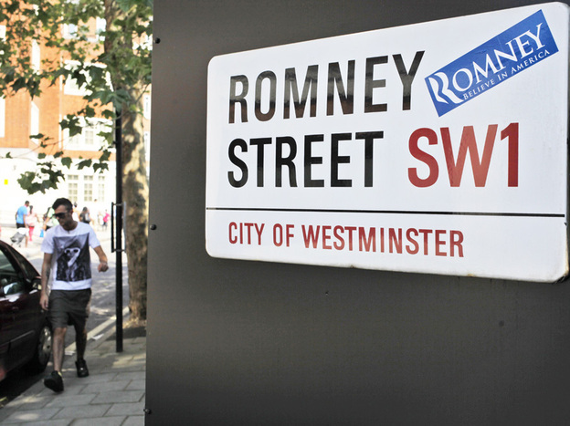 A campaign sticker for Republican presidential candidate Mitt Romney is seen on a sign for Romney Street in London on Wednesday, as Romney arrived to meet with leaders, hold fundraisers and attend the opening of the Olympics.