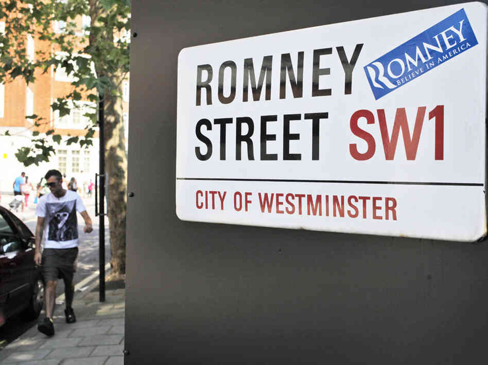 A campaign sticker for Republican presidential candidate Mitt Romney is seen on a sign for Romney Street in London on Wednesday, as Romney arrived to meet with leaders, hold fundraisers and attend the opening of the Olympics.