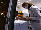 Nurse Maria Vatista draws blood from a Greek drug addict for an HIV test in a mobile testing van in Athens last year. HIV infection rates are rising, as Greece's financial crisis has led the government to cut health and social services, including a successful needle exchange program. Nurse Maria Vatista draws blood from a Greek drug addict for an HIV test in a mobile testing van in Athens last year. HIV infection rates are rising, as Greece's financial crisis has led the government to cut health and social services, including a successful needle exchange program.