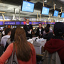 Travelers crowd around a ticketing counter at John F. Kennedy International Airport in April 2010 in New York.