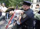 An Occupy Wall Street protestor is arrested in Zuccotti Park July 11, 2012, in New York. An Occupy Wall Street protestor is arrested in Zuccotti Park July 11, 2012, in New York.