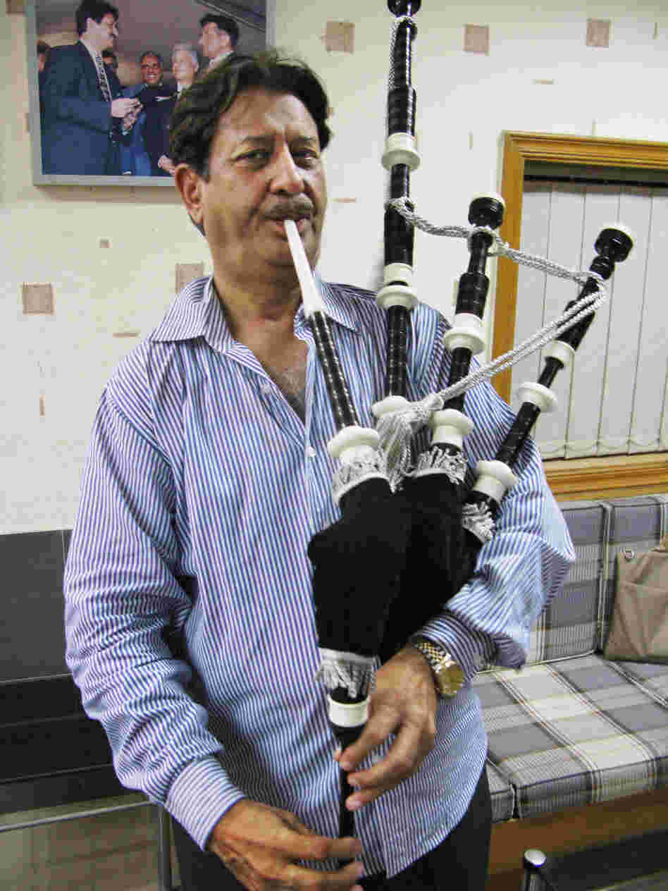 Naeem Akhbar is chief executive of Halifax and Co., a more than 70-year-old bagpipe manufacturer in Sialkot. Here, he plays the most expensive bagpipe his company produces, which sells for $700 in Pakistan and more than $1,600 in Europe and the U.S.