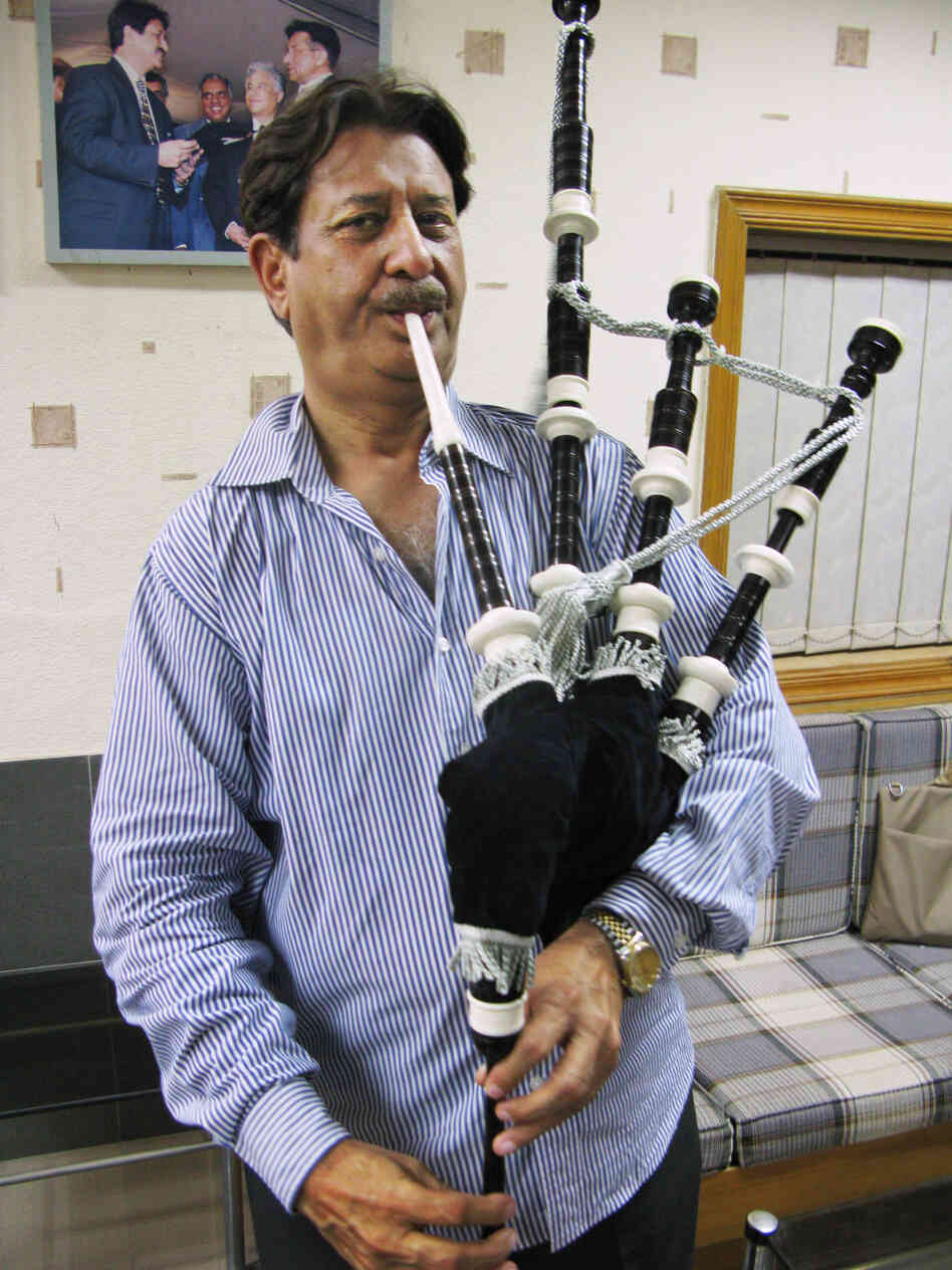 Naeem Akhbar is chief executive of Halifax and Co., a more than 70-year-old bagpipe manufacturer in Sialkot. Here, he plays the most expensive bagpipe his company produces, which sells for $700 in Pakistan and more than $1,600 in Europe and the U.S.