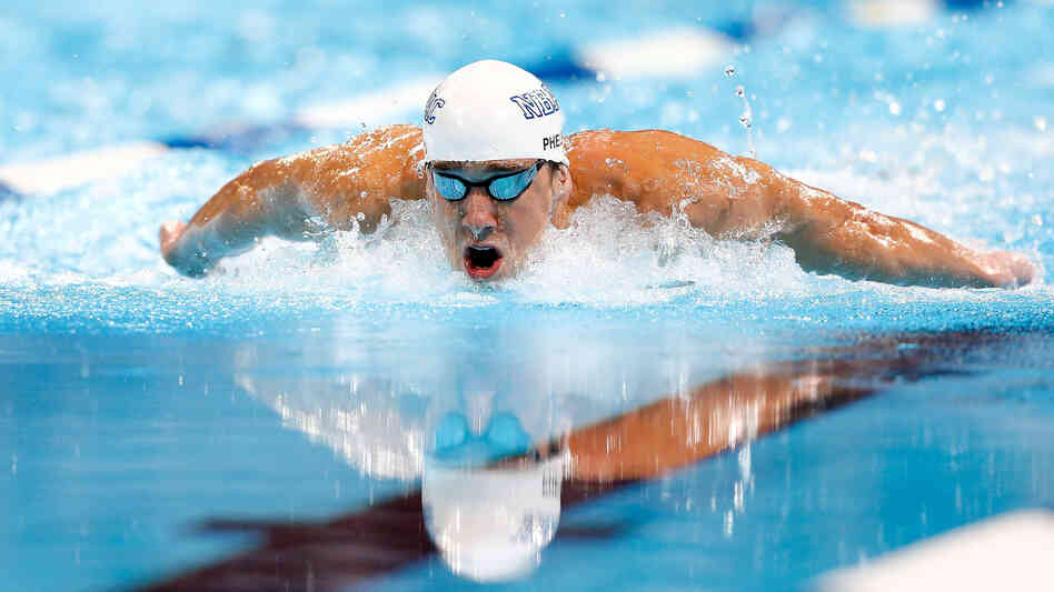 Endurance athletes like Michael Phelps, here at the 2012 U.S. Olympic Swimming Team Trials in Omaha, can easily burn off stacks of pancakes.