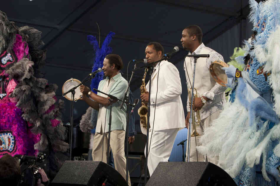 Albert Lambreaux (Clarke Peters), Donald Harrison and Delmond Lambreaux (Rob Brown) perform with Mardi Gras Indians at the New Orleans Jazz and Heritage Festival, on Treme.