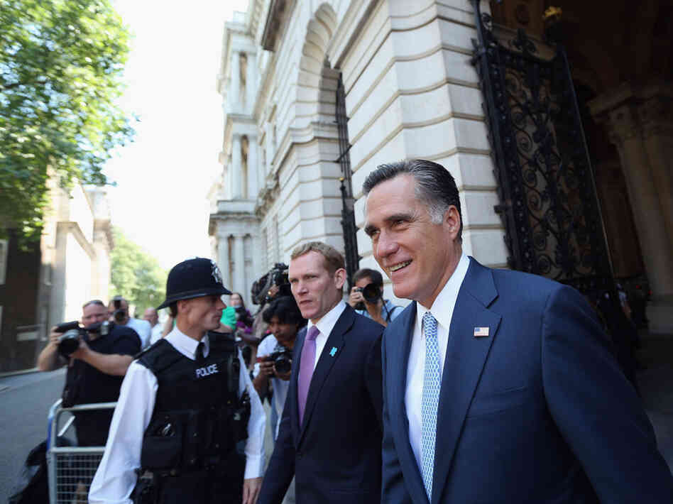 Republican presidential candidate Mitt Romney arrives at Downing Street in London on Thursday to meet with British Prime Minister David Cameron.