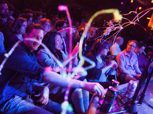 Ask Me Another fans celebrate the show's season one finale at The Bell House in Brooklyn, New York. Ask Me Another fans celebrate the show's season one finale at The Bell House in Brooklyn, New York.