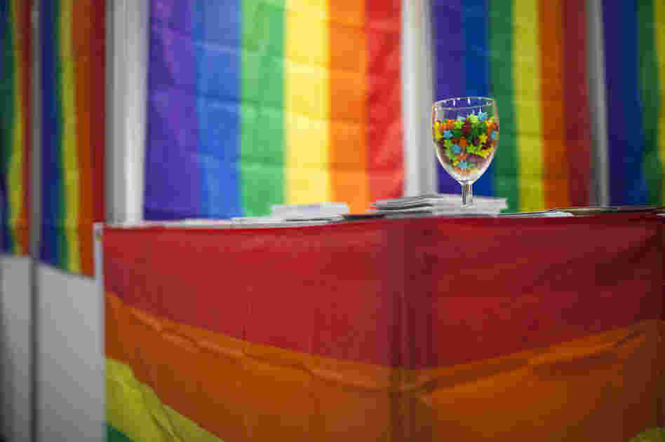 Colorful flags and candies decorate the LGBT Networking Zone. More than 120 groups from around the world set up booths in the Global Village to distribute information about the AIDS epidemic.