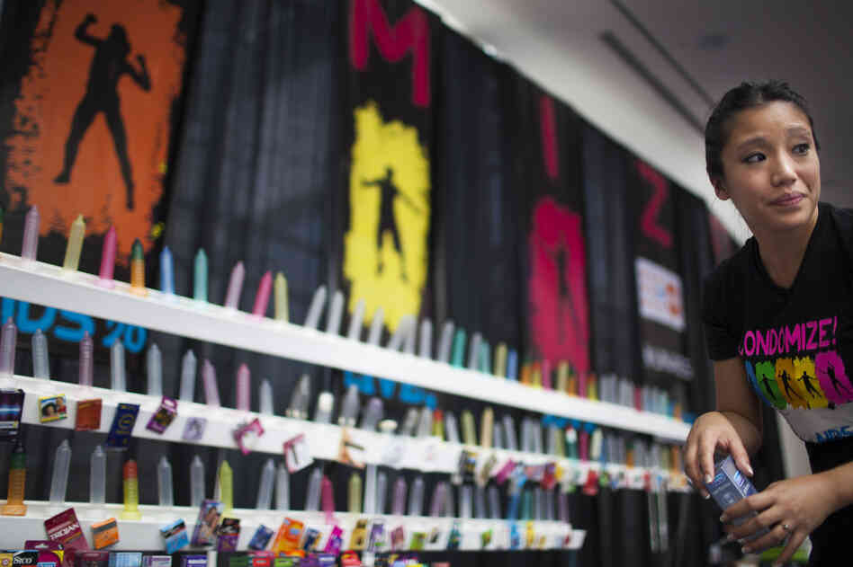 "You've been condomized!" said Joy Lynn Alegarbes, of The Condom Project, which promoted safe sex at the 19th International AIDS Conference. The group handed out more than 850,000 condoms this week.