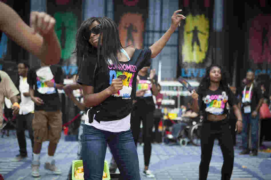 Music and dancing filled the Global Village from morning to evening, often spilling out into other parts of the convention center. Khadijan High, a member of the Dance Institute of Washington, performed a hip-hop routine for The Condom Project.