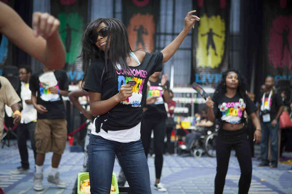 Music and dancing filled the Global Village from morning to evening, often spilling out into other parts of the convention center. Khadijan High, a member of the Dance Institute of Washington, performed a hip-hop routine for The Condom Project.