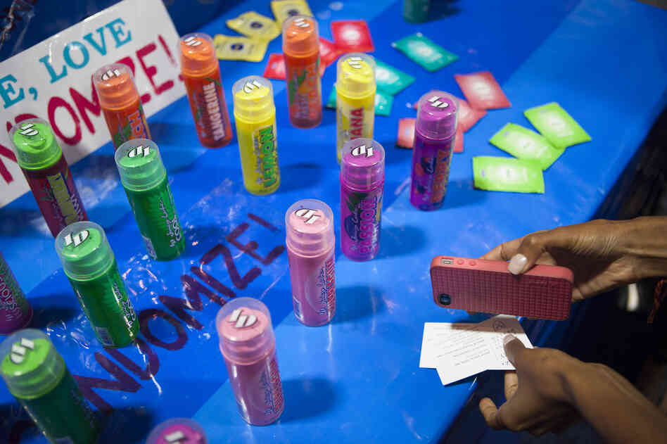 A lubricant tasting booth in the Global Village set up by The Condom Project. The booth offered a variety of fruit flavors, as well as vegan and sugar-free options.