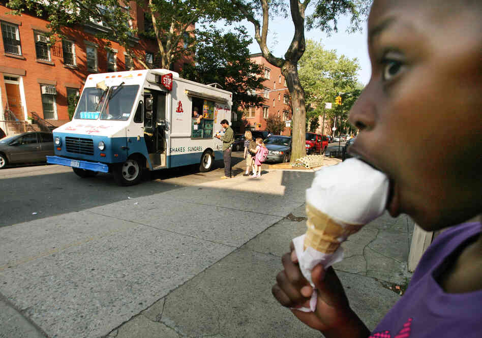 A Mister Softee ice cream truck makes its way through the streets of Brooklyn, New York in 2007.