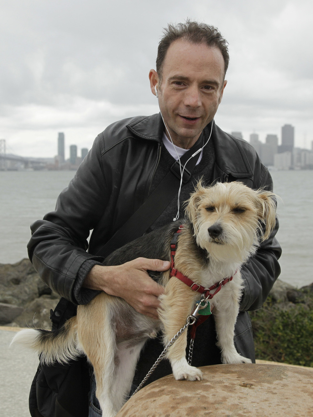 Timothy Ray Brown, shown in May 2011 with his dog Jack in San Francisco, is the only man ever known to have been fully cured from AIDS. Brown is known as the "Berlin patient" because he had a bone marrow transplant in a German hospital five years ago.