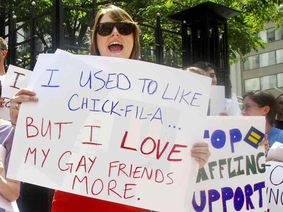 Protesters from the Human Rights Campaign chant against Chick-fil-A President Dan Cathy's anti-gay marriage stance in front of a Chick-fil-A food truck in Washington, D.C., on Thursday.