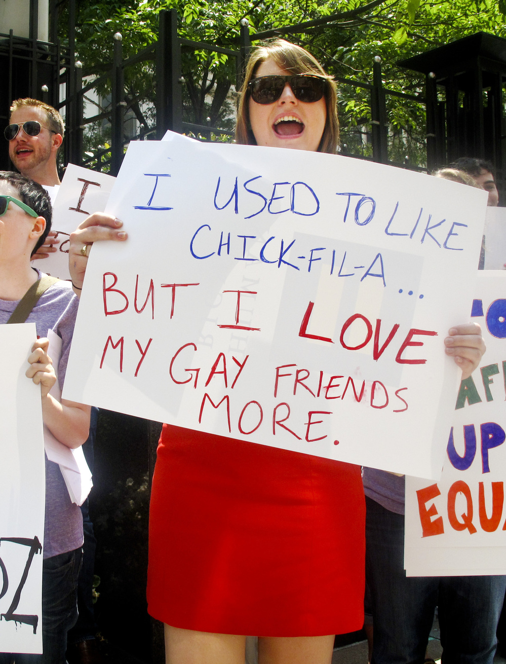 Protesters from the Human Rights Campaign chant against Chick-fil-A President Dan Cathy's anti-gay marriage stance in front of a Chick-fil-A food truck in Washington, D.C., on Thursday.