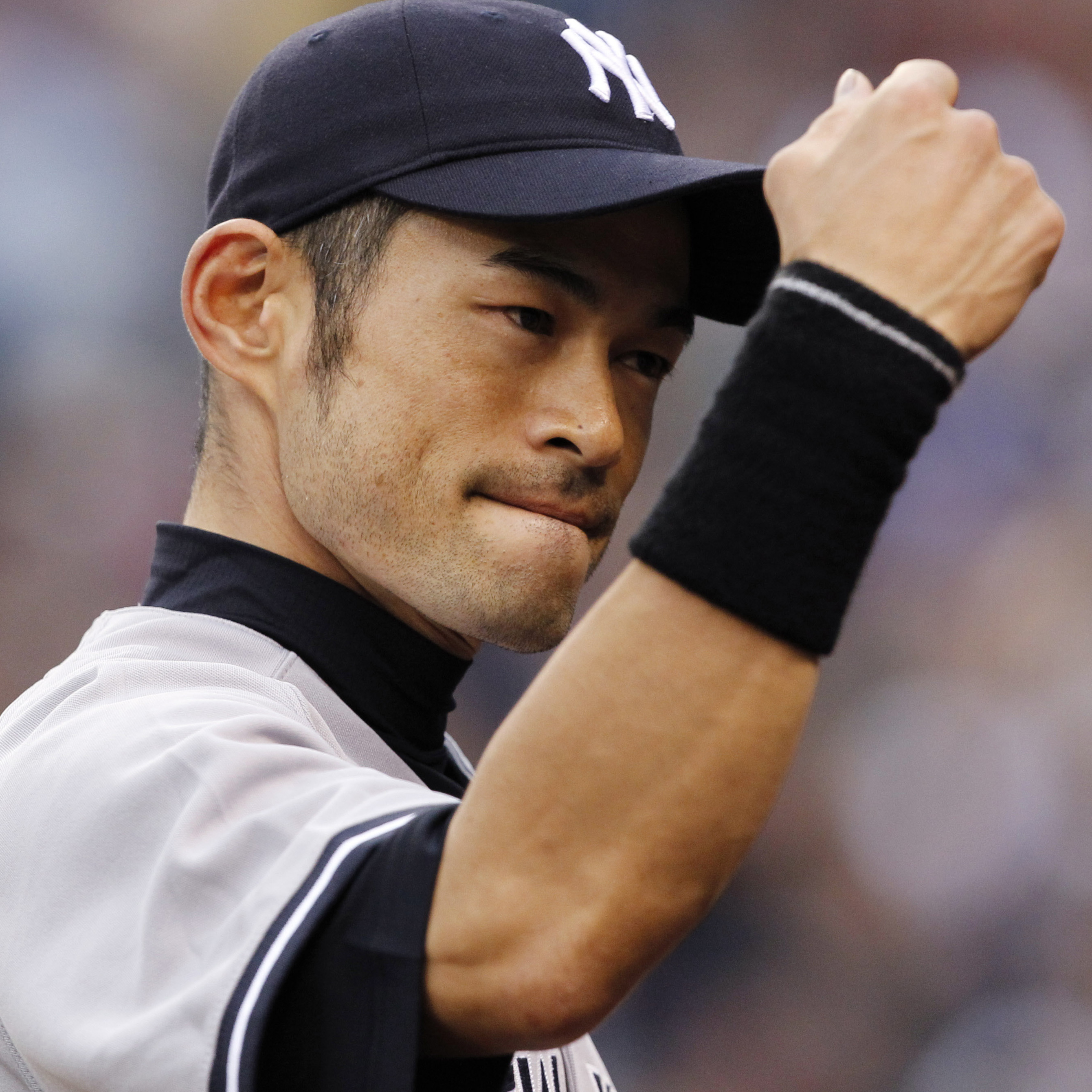New York Yankees right fielder Ichiro Suzuki readies for a fist bump ... or a fist pump for his new song?